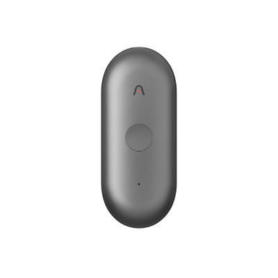 Gray Plaud NotePin AI voice recorder with a pill-shaped design, central button, and indicator light.