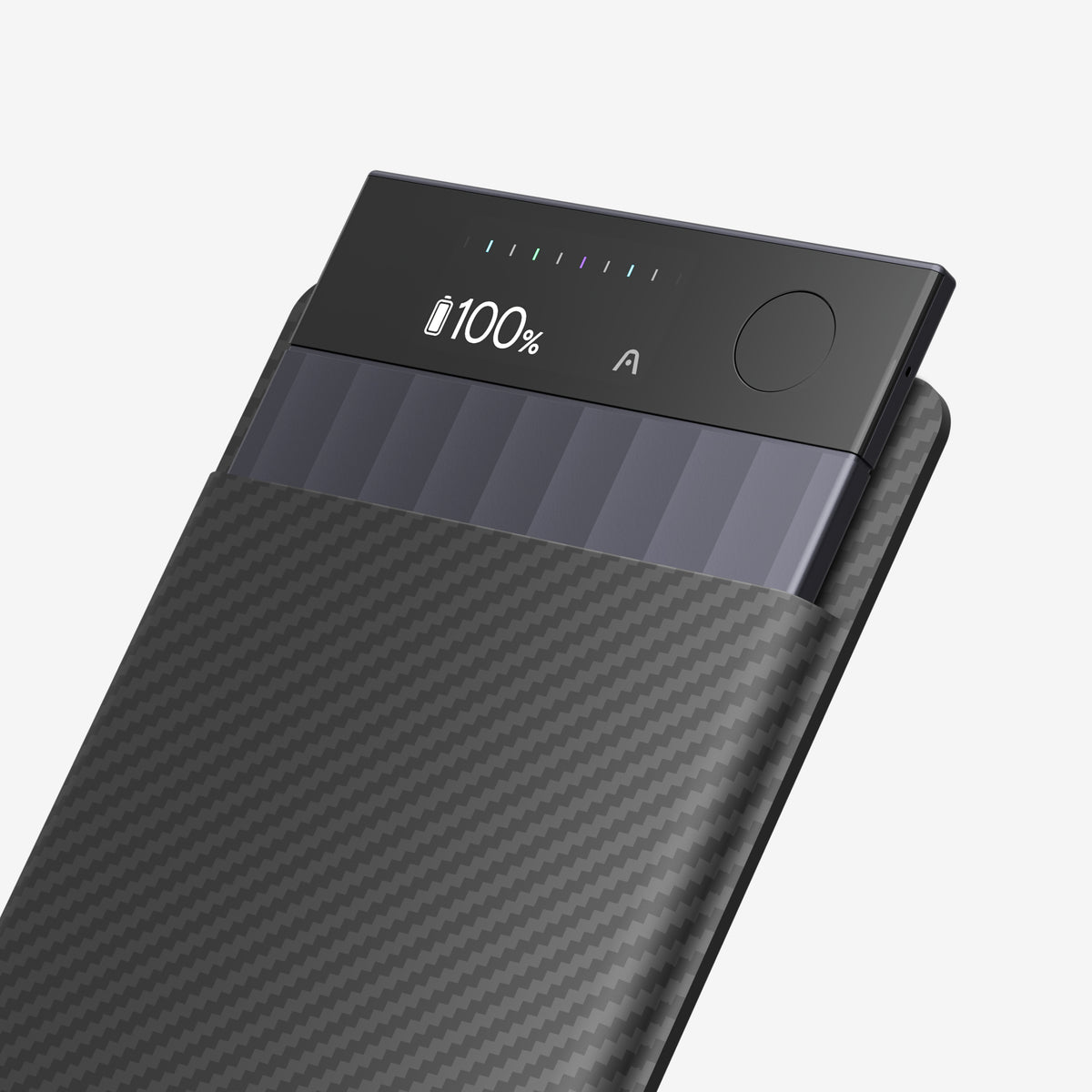 Plaud Note Pro voice recorder in a carbon fiber case, showing 100% battery on its digital display.