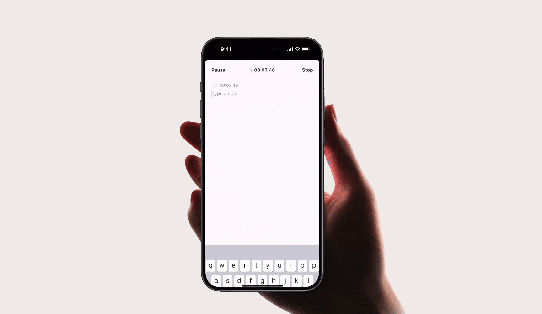 Hand holding a smartphone showing the PLAUD app interface with a live recording and a text field for typing notes.