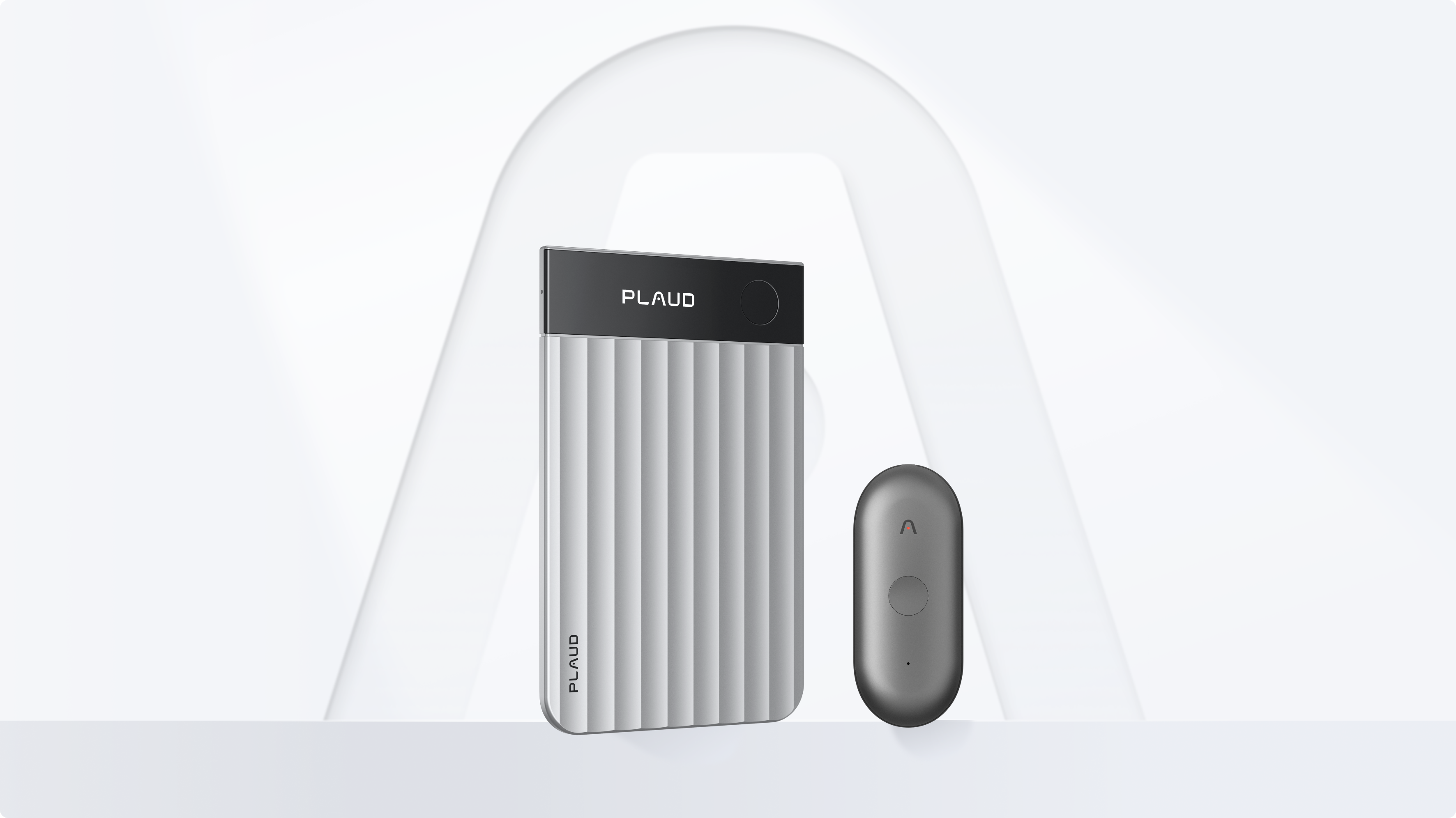 Plaud Note and Plaud NotePin AI voice recorders side-by-side against a minimalist background.