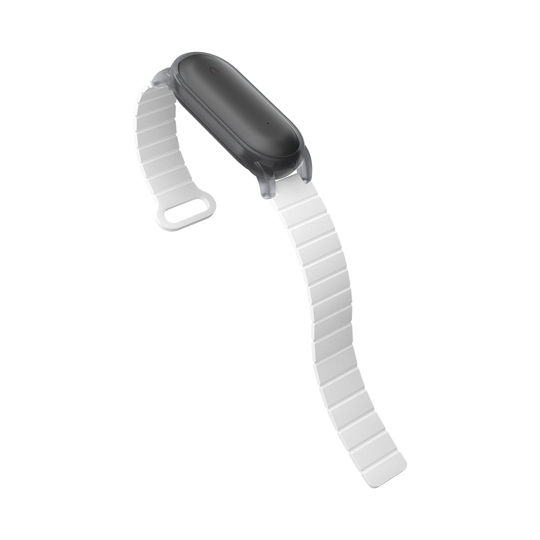 Black Plaud NotePin AI voice recorder shown with a white, flexible wristband accessory.