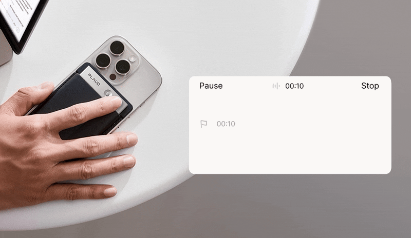 Hand pressing the button on a Plaud Note attached to a phone, with a UI overlay showing recording controls.