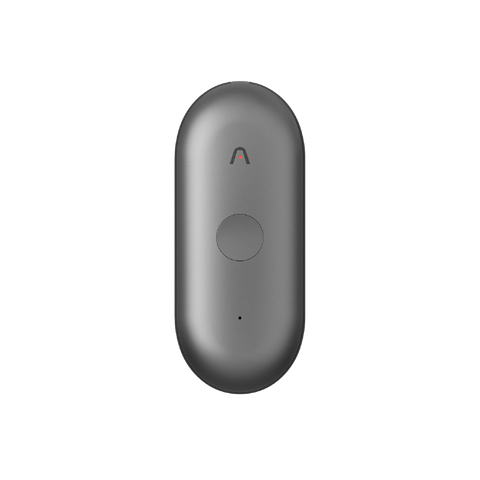 Gray Plaud NotePin AI voice recorder with a pill-shaped design, central button, and indicator light.