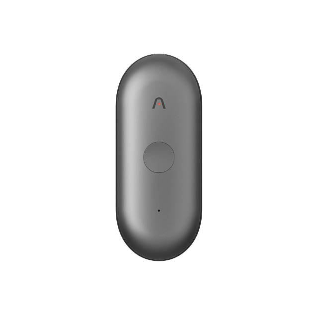 Gray Plaud NotePin AI voice recorder with a pill-shaped design, central button, and indicator light.