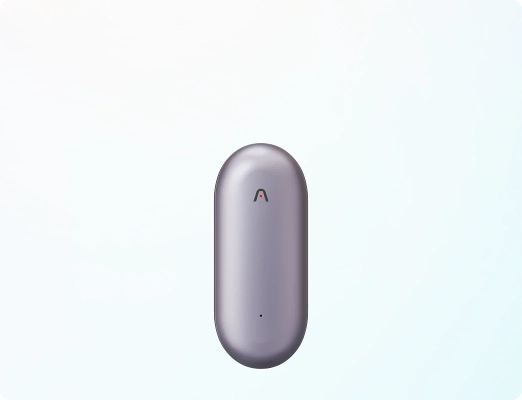Purple Plaud NotePin wearable AI voice recorder with a minimalist pill-shaped design.